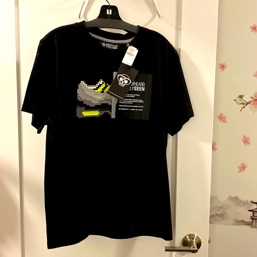 Brand new. Mostlyheard rarelyseen. Man cool t shirt!!! Best ever!!